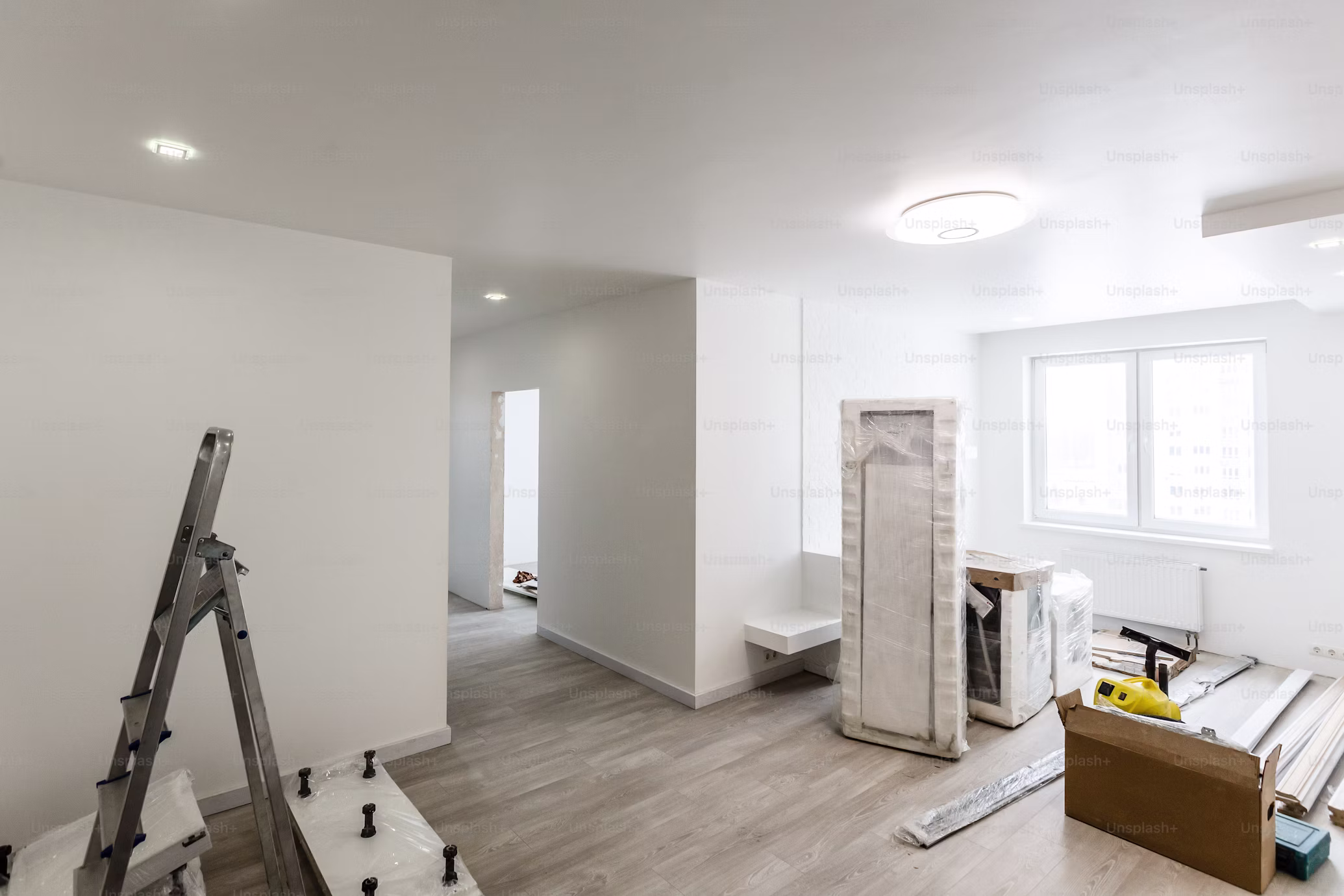 Bathroom renovation in progress with fresh white finishes